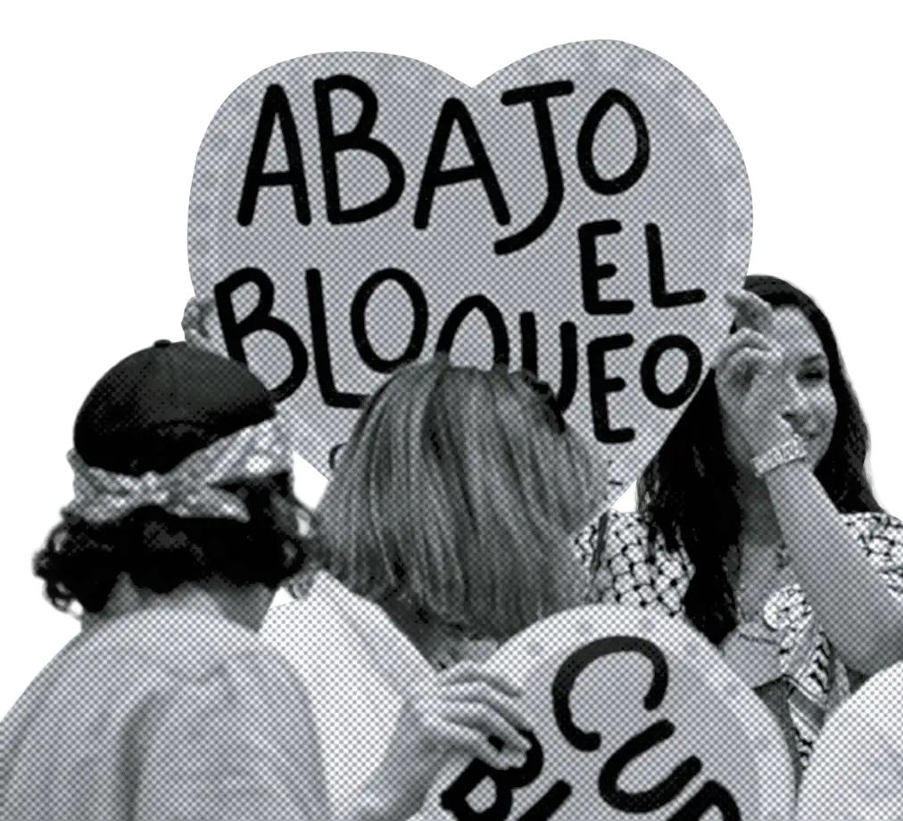 Demonstrators holding a sign that reads “Abajo el bloqueo” (Down with the blockade)