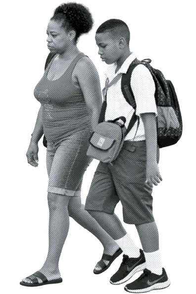 A mother and her son walking to school